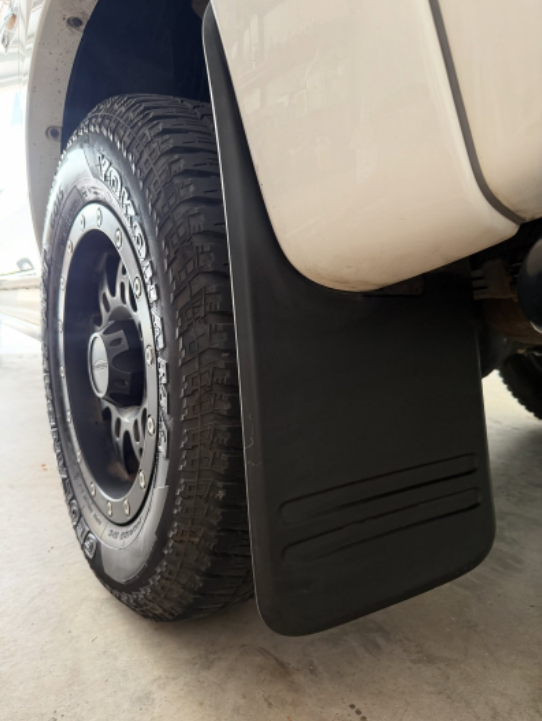 Before restoring faded 4WD plastic mud flaps with Rig Renew. Long lasting. Silicone Free